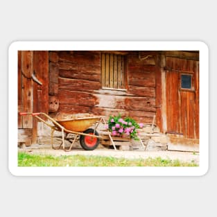 Rusted Wheelbarrow in Front of Wooden Farm House Sticker